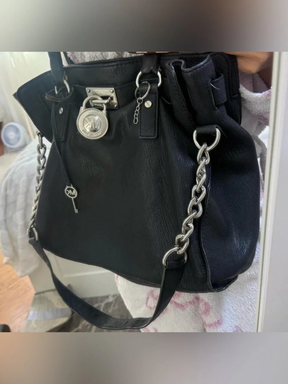 Black Leather Handbag with Silver Chain Accent